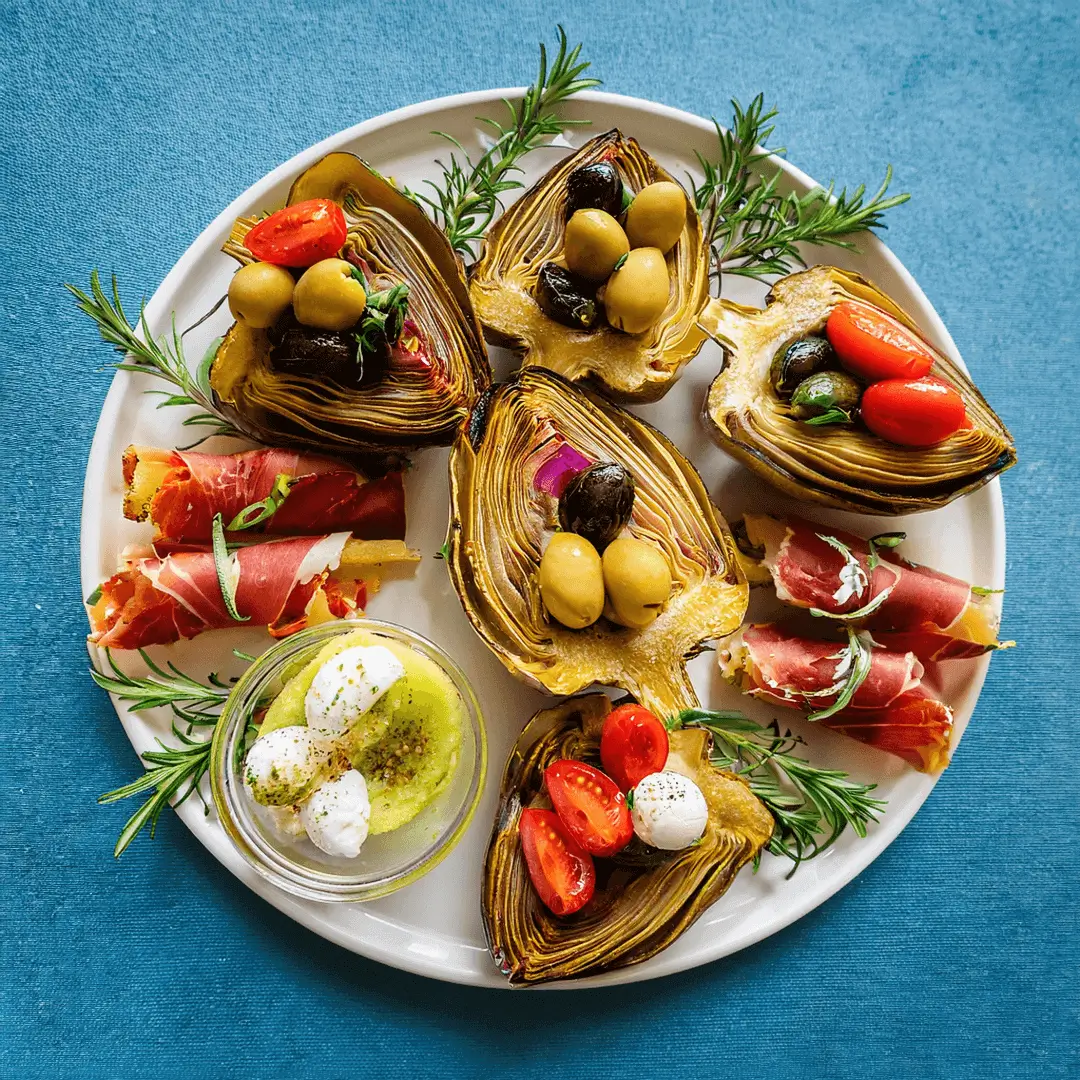 Antipasto platter with artichokes and meats.