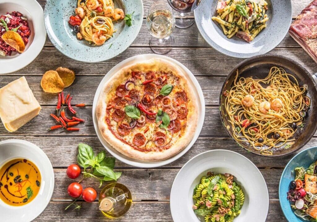 A table with many different types of food.